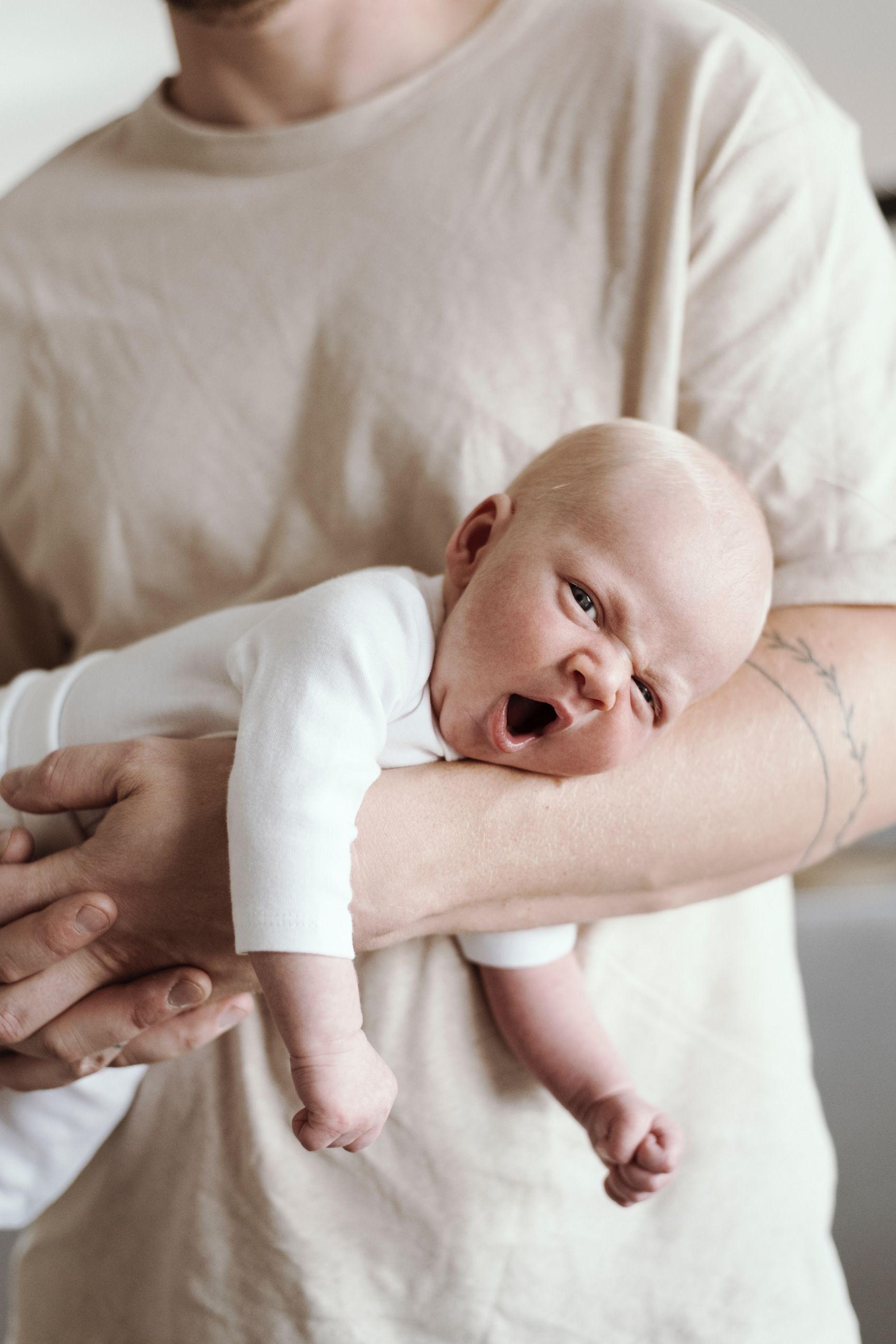 Portrait of a newborn child with albinism.