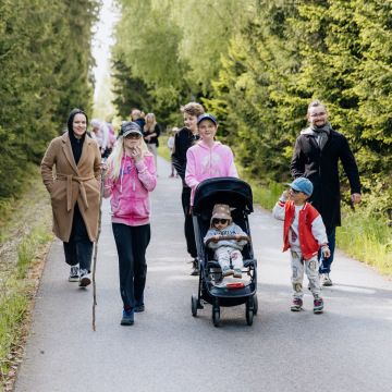Families with children with albinism attending a community gathering.
